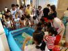 龙湖公馆“六·一”探秘海洋主题活动业主和孩子正在参加钓鱼趣味活动