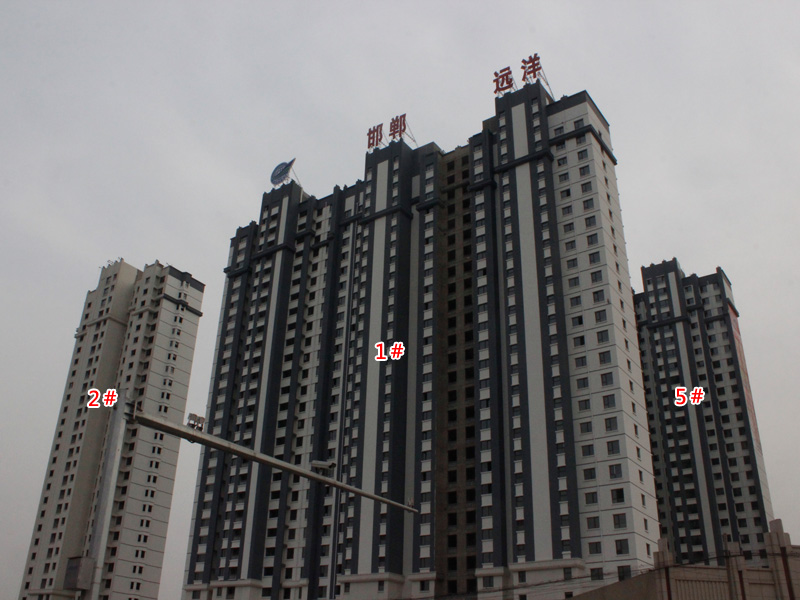 远洋新兴公馆施工进度高调进行 外立面装潢神速