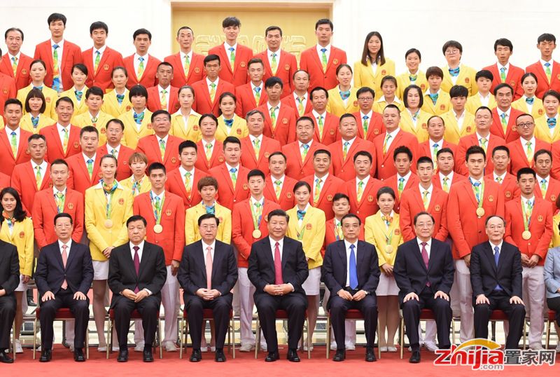习近平等会见第31届奥林匹克运动会中国体育代表团全体成员